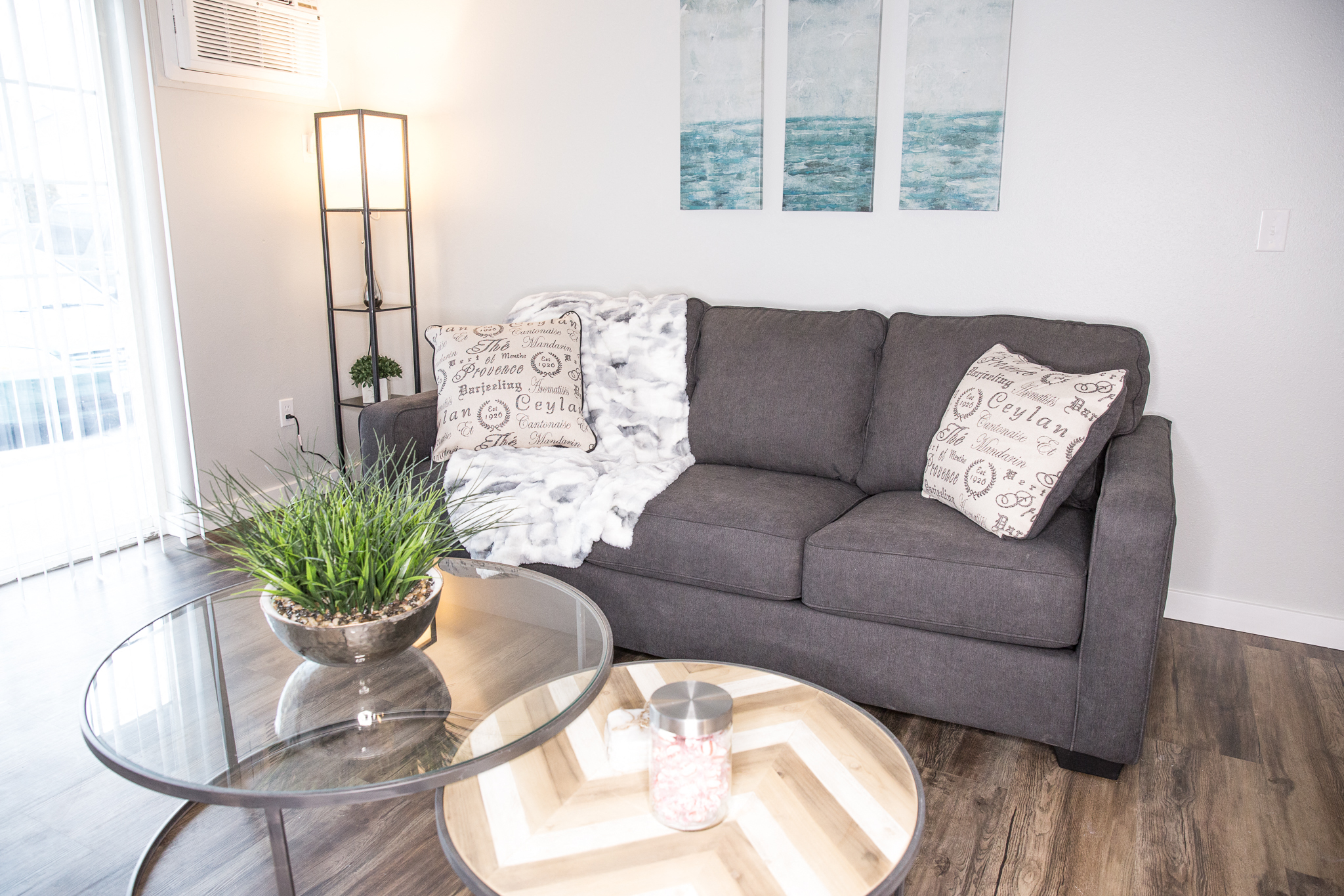 a living room with a couch and a coffee table